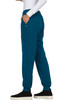 A pair of teal jogger pants with pockets and a relaxed fit, featuring a waistband and ankle cuffs.