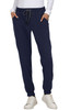 A pair of navy jogger pants with a drawstring waist and side pockets, worn with a long-sleeve white top.