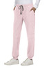 Light pink jogger pants with a drawstring waist, side pockets, and a branded logo located on the leg.