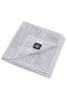 A grey hand towel with striped detailing, featuring a logo in the corner.