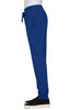A pair of royal blue jogger pants with an elastic waistband and pockets, worn with black shoes.