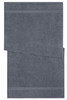 A grey bath towel featuring a textured design and subtle stripes. The towel has a logo on it.