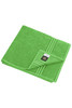 A bright green bath towel featuring a folded corner and a logo. Soft texture with decorative stripes.