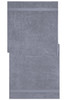 A grey sauna sheet with a textured surface and two striped accents. It has a simple, elegant design.