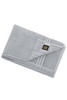 A grey bath sheet featuring a folded design and a logo on the corner. Soft and absorbent fabric.