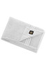 A folded grey bath sheet with a striped design and a logo on the corner.