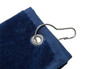 A navy blue golf towel with a grommet and clip for attachment. It features a soft texture.
