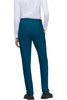 Atria Pant in teal, featuring a slim fit and a back view. The model wears a white long-sleeve top and black shoes.