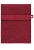 A red hand towel featuring a textured band and a hanging loop, with a logo present.