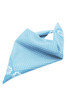 A traditional blue bandana featuring a patterned design, with floral elements and a logo.