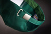 A green 6 panel workwear cap featuring a metal adjustable strap and a brand logo inside.