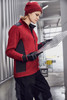 A red knitted fleece workwear beanie is worn by a person holding a map, dressed in a matching red fleece top and gloves.
