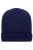 A soft knitted winter beanie in navy blue with a folded brim. Features a simple design and no visible logos.