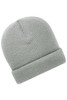 A soft knitted winter beanie in a light grey colour with a ribbed texture and a rolled cuff.