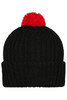 A black knitted beanie with a red pompon on top and a ribbed design. It features a branding logo.