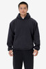 A heavy fleece hooded pullover in black, featuring a kangaroo pocket and a relaxed fit.