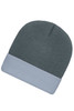 A knitted beanie in a dark grey colour with a light grey cuff, featuring a small logo.