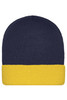 A knitted beanie featuring a navy blue top and a yellow cuff. The beanie has a logo on it.