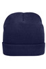 A knitted beanie in navy blue featuring a folded cuff and a soft, textured finish. It has a logo on the side.