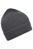 A ribbed beanie in dark grey with a logo. The beanie features a classic, snug fit design.