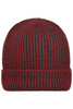 A ribbed beanie in dark red and black with a folded cuff. It has a logo on the side.