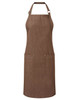 A brown organic denim bib apron featuring adjustable straps and two front pockets, with a logo on the side.