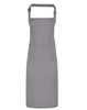 A waterproof bib apron in a sleek grey colour, featuring an adjustable neck strap and solid design.