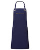 A navy blue bib apron featuring contrast stitching and a zippered pocket, with two side pockets and adjustable straps.