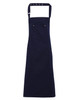 A navy blue Chino Cotton Bib Apron with adjustable straps and multiple pockets, featuring a logo.