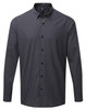 A button-up shirt in a black and grey checked pattern, featuring a collar and long sleeves. It has a logo.