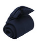 A rolled navy tie secured with a clip, featuring a sleek and simple design.
