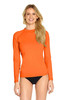 An orange adult long sleeve rashie with UPF 50+ protection, modelled by a woman. Features a logo.