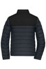 A ladies padded puffer jacket featuring a black top section and navy blue body, with a logo on the back.