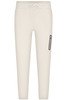 Men's interlock pants in a light cream colour, featuring a drawstring waist and a side pocket with branding.