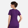A women's double V-neck top in purple with a contrasting grey neckline and a logo on the back.