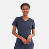 A women's navy V-neck top with short sleeves, featuring a fitted design and a logo detail.
