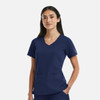 A women's curved V-neck top in navy blue, featuring short sleeves and front pockets, with a logo on the sleeve.