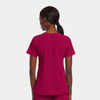 A women's mock wrap top in a vibrant magenta colour, featuring short sleeves and a simple design. It has a logo.