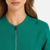 A full zip bomber jacket in a vibrant green colour, featuring a sleek design and a logo on the shoulder.