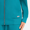 A teal women's full zip bomber jacket featuring a ribbed hem and cuffs, with a small logo on the side.