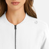 A white women's full zip bomber jacket featuring a zip closure and a small logo on the shoulder.
