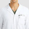 A white lab coat with a pocket, featuring a phone and pen. It's designed for a professional appearance.