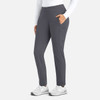 Mid-rise tapered pants in dark grey with a side pocket, paired with a white long-sleeve top and white shoes.