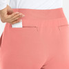 A pair of women's mid-rise joggers in light pink with a back pocket detail.