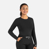 A long-sleeve black underscrub tee with a round neckline, featuring a logo and paired with dark pants.