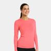 A long-sleeved tee in coral pink, featuring a fitted design and a branding logo.