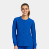 A blue women's round neck snap jacket with long sleeves and two front pockets, featuring a logo.