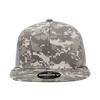 A high-profile structured trucker cap in grey camouflage with a black logo on the front and mesh panels.