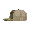 A high-profile structured trucker cap in camouflage with a mesh back and a flat brim. It features a logo.
