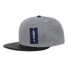 A grey melton snapback cap with a black brim and a logo tag attached.